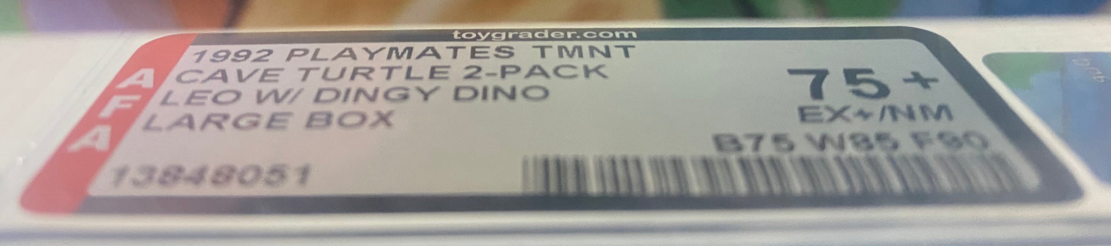 Teenage Mutant Ninja Turtles Cave Turtle Leo and Dingy Dingo Boxed Figure graded AFA 75+. Grade label photo close-up.